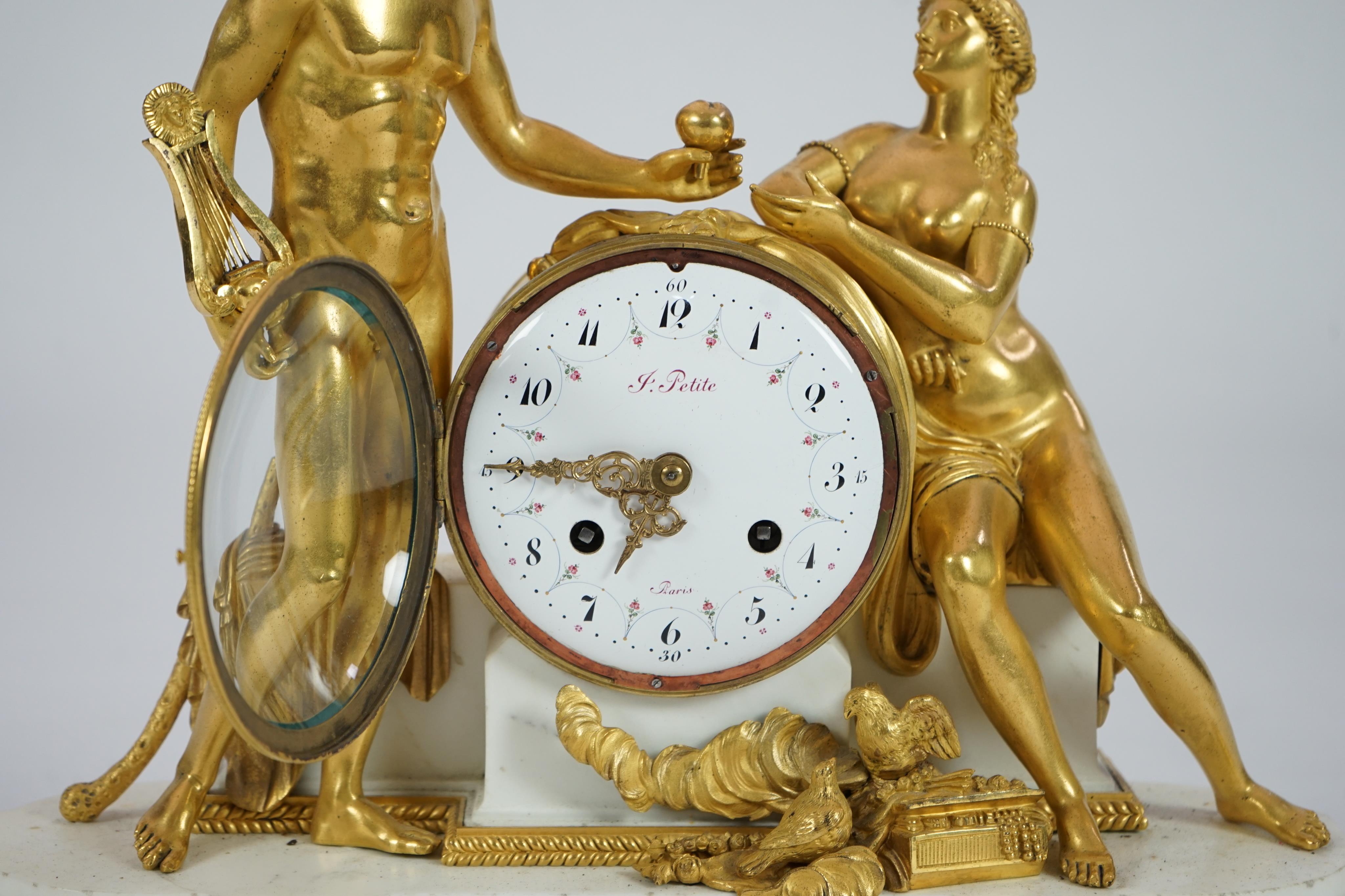 J. Petite of Paris. A 19th century French ormolu and white marble eight day mantel clock